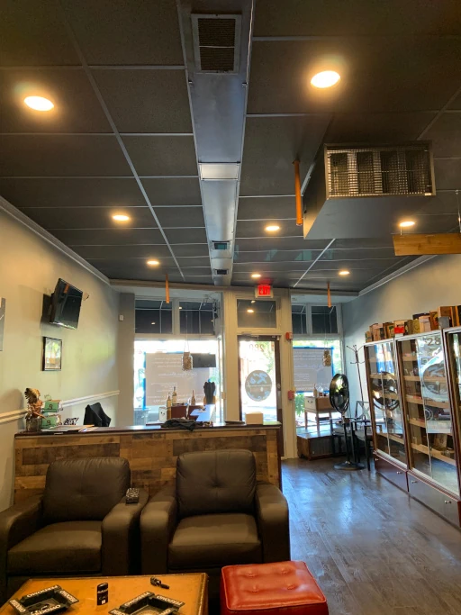 Hardwood floors, comfortable seating, and recessed lighting.