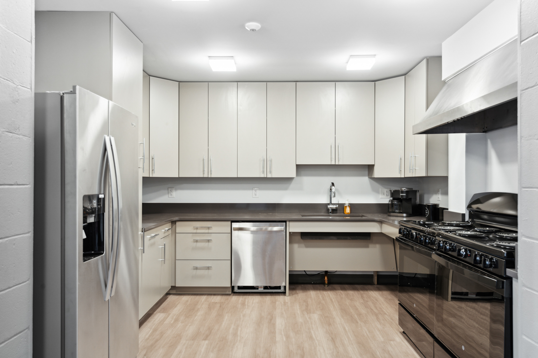 Accesible kitchen. Wheel chair accessible sink. Ample counterspace. Upgraded appliances. Stainless steel appliances. Large overhead cabinets. Custom cabinets. Stainless steel dishwasher. Stainless steel fridge. Stainless steel oven hood. Dual ovens. New flooring. Updated paint. 