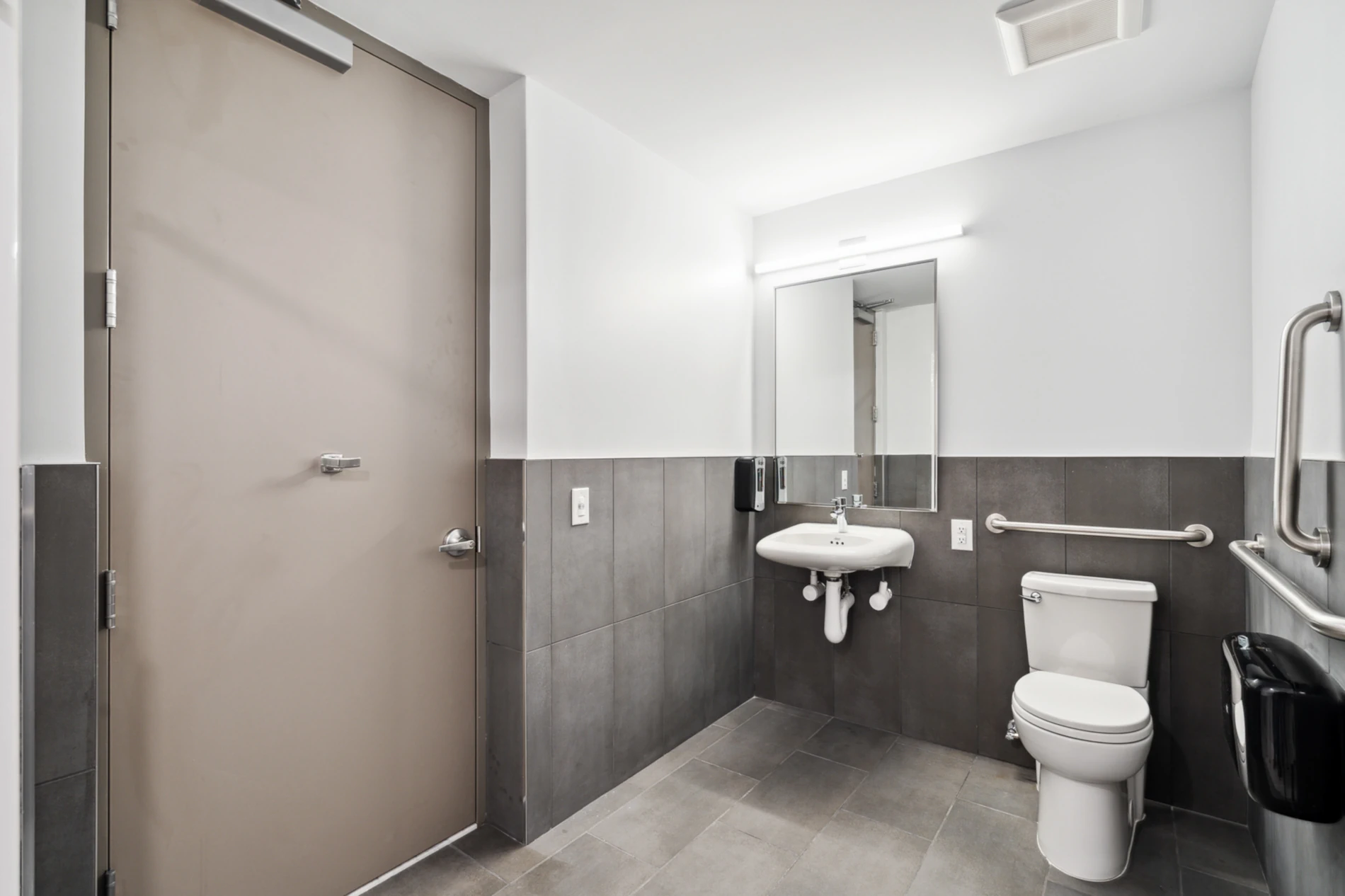 Accessible bathroom with Modern tile. 