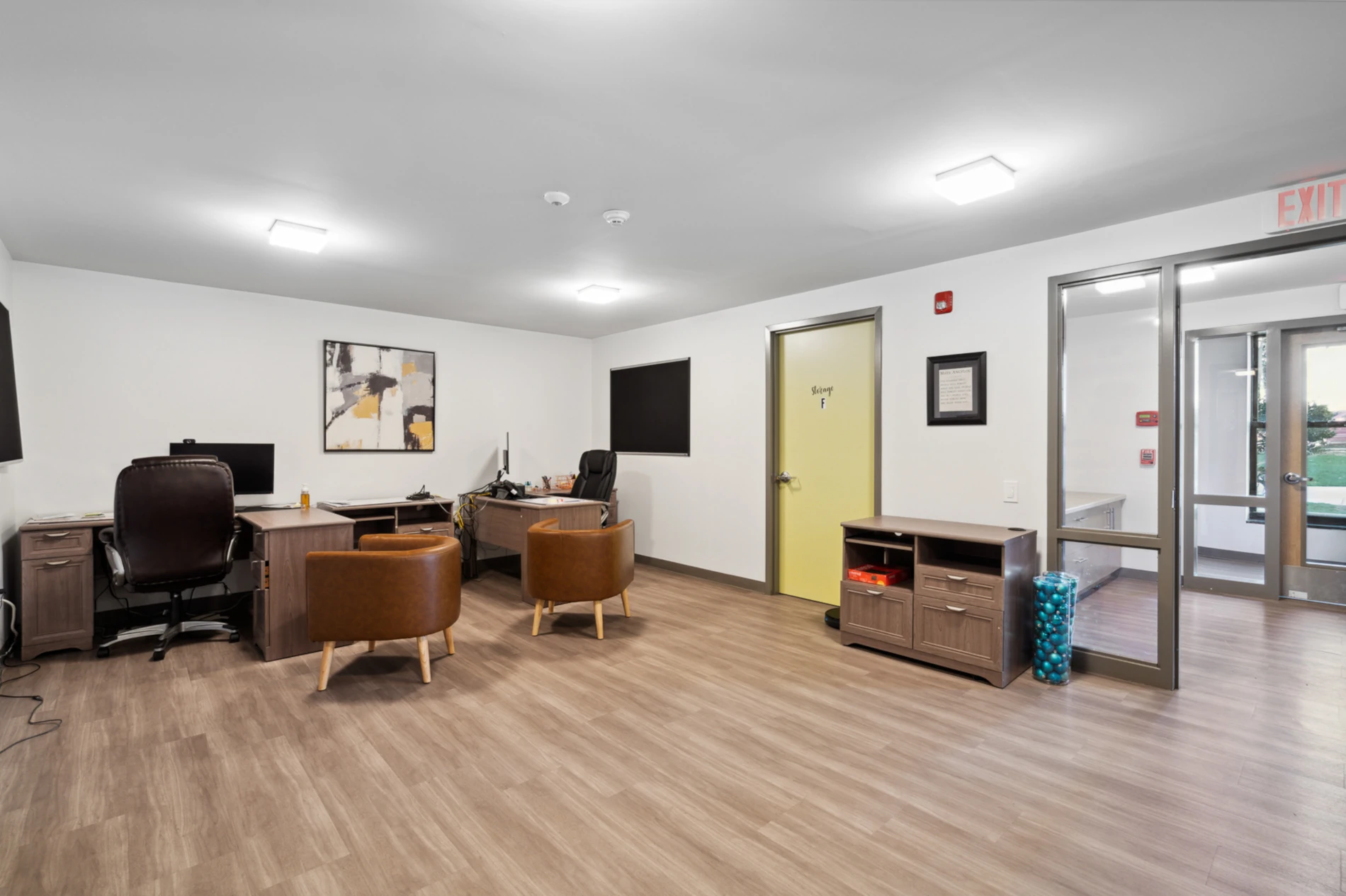 Remodeled private office with lots of modern lighting.