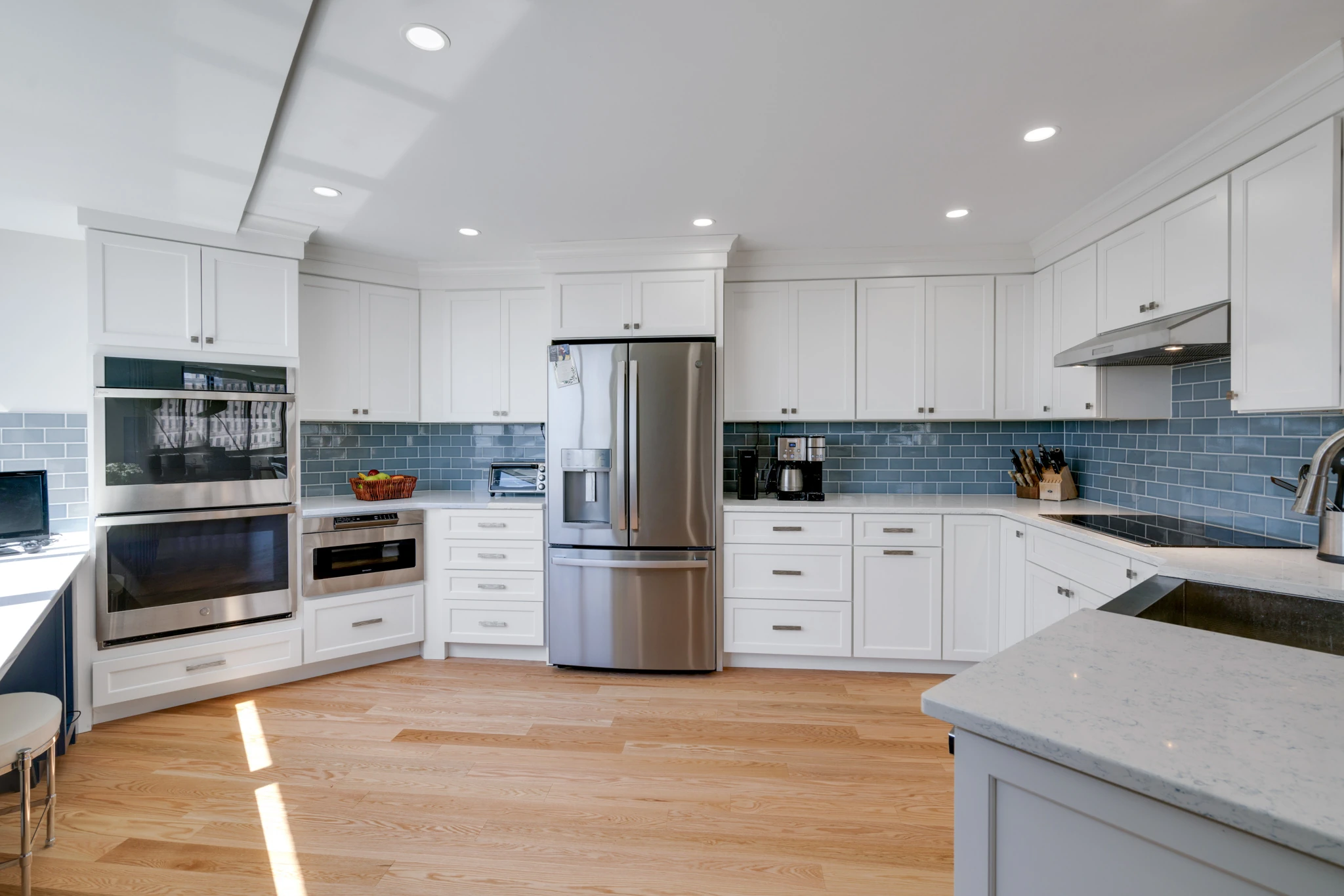 Custom spacious kitchen remodel. New cabinetry, countertops, lighting.