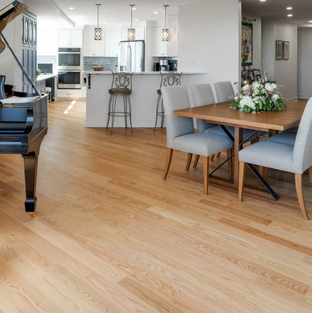 Home featuring custom hardwood and laminate flooring throughout.